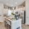 Modern townhome kitchens with an island and stainless steel applainces at Cadia Grand Prairie