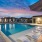 Resort-style swimming pool with a sunshelf at Cadia Grand Prairie