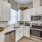 Stainless steel appliances inside townhome kitchens at Cadia Grand Prairie